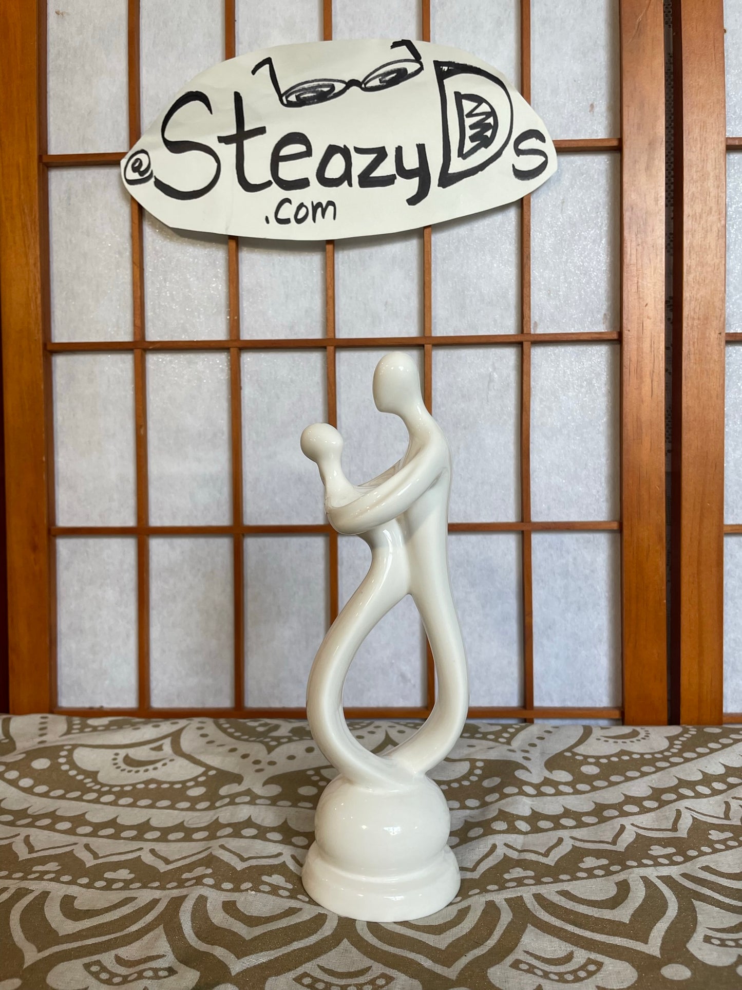 Brilliant Embrace Porcelain Figure